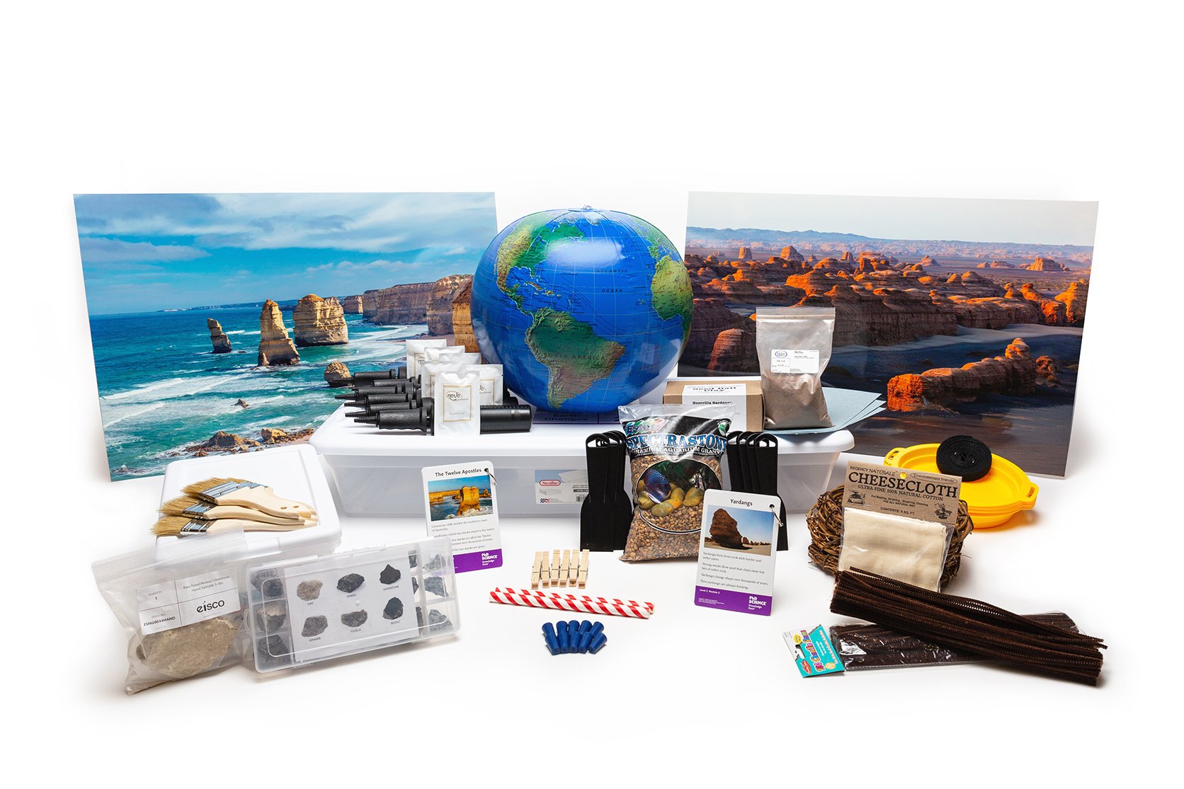 PhD Science hands-on materials kit from Level 2 Module 2 that includes an inflatable globe, Knowledge Deck cards and posters, and rock samples