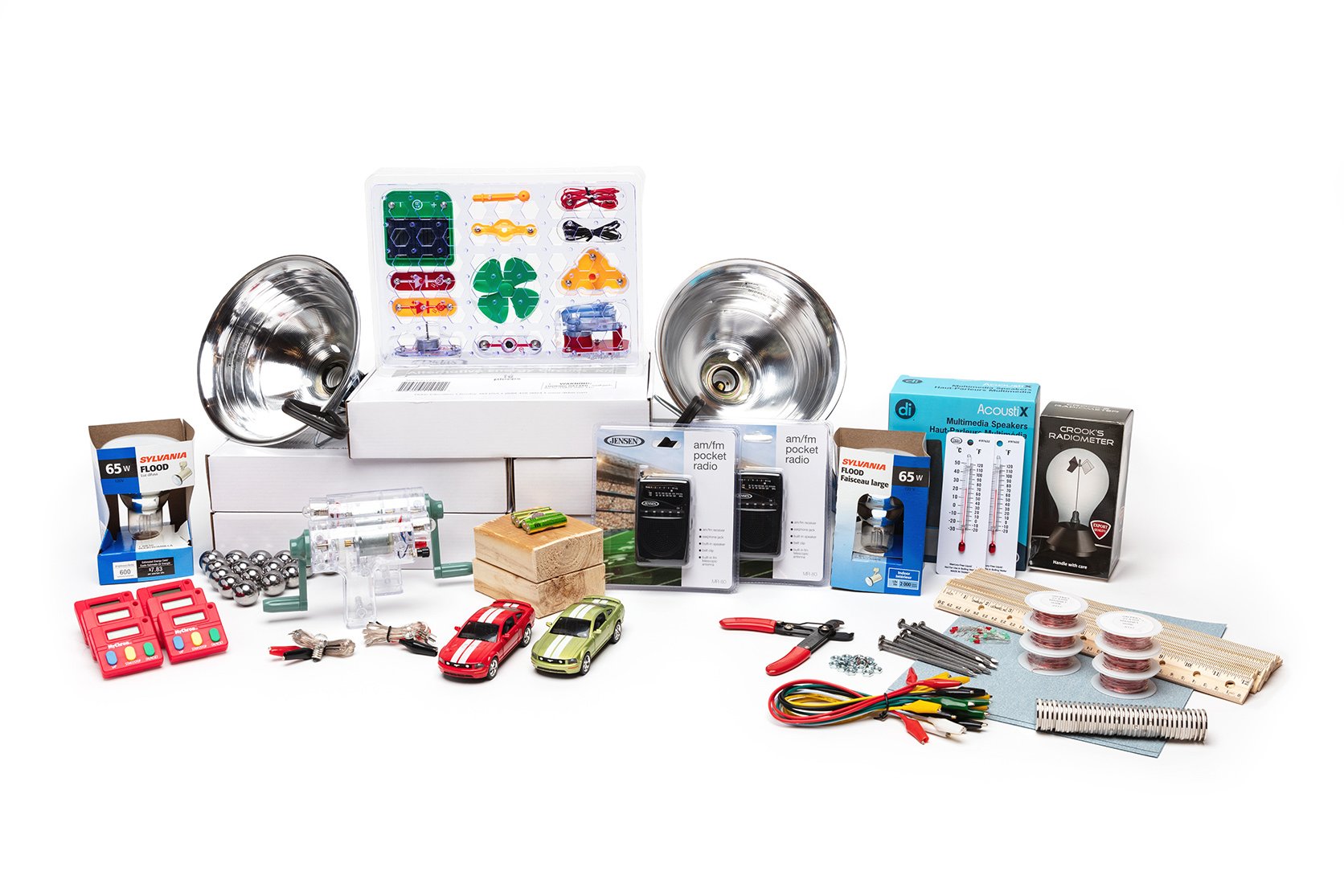 PhD Science hands-on materials kit from Level 4 Module 2 that includes Snap Circuits kits, heat lamps, a radiometer, and alligator clip cords