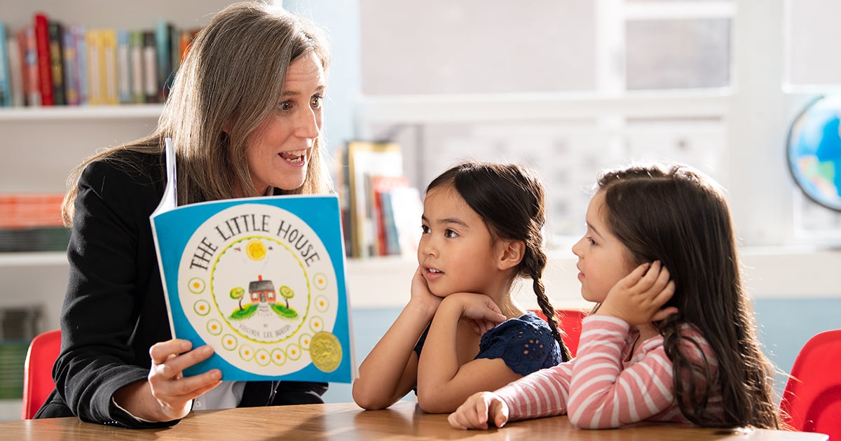 Wit & Wisdom Teacher with Young Students in Book Reading Circle