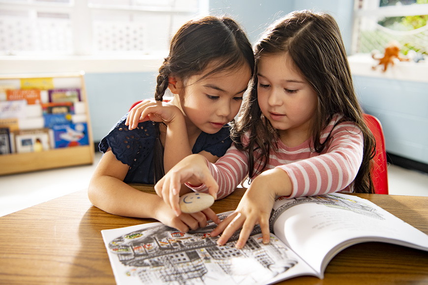 Two Wit and Wisdom students using Story Stones