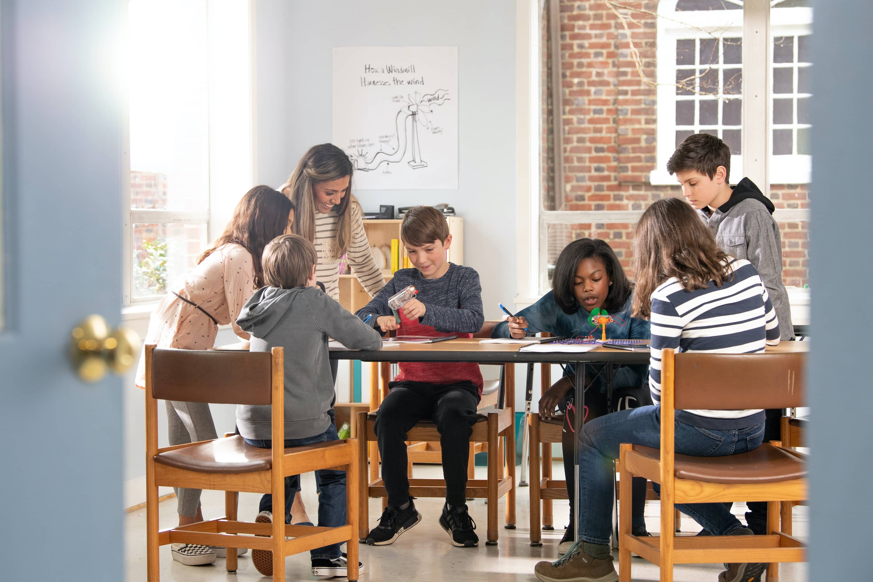 PhD Science students and teacher in the classroom